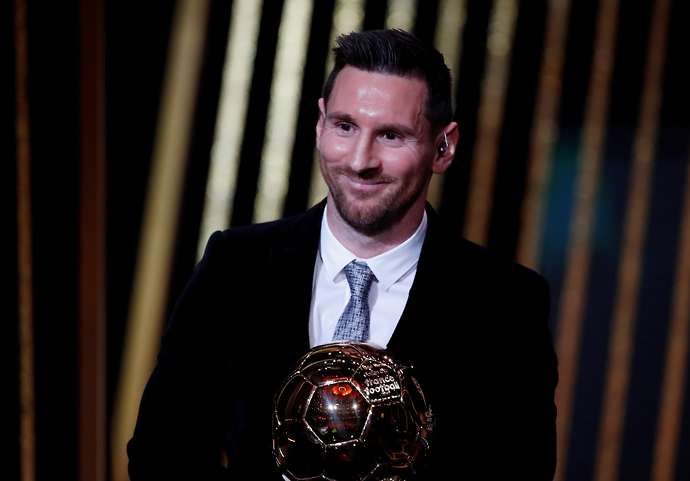 Messi with the Ballon d'Or