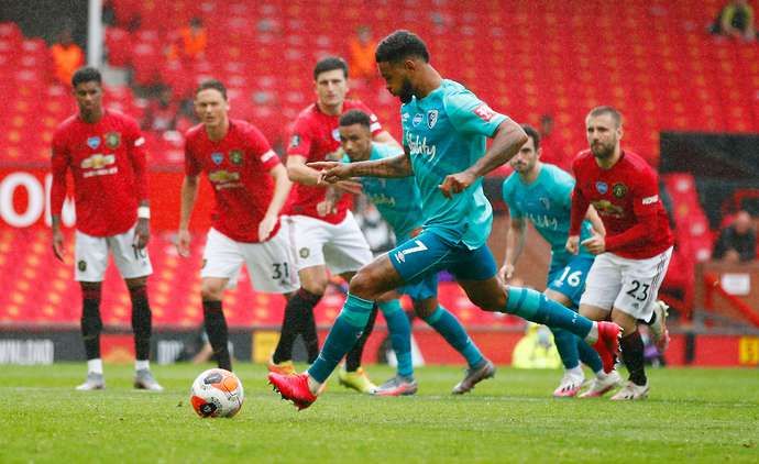Joshua King takes a penalty for Bournemouth at Old Trafford against Manchester United