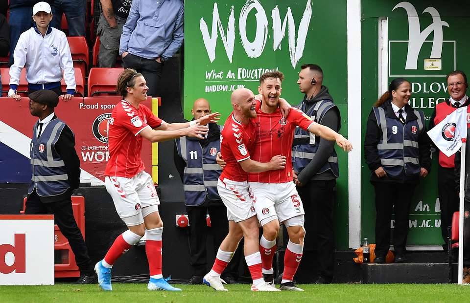 Conor Gallagher celebrates with Charlton players