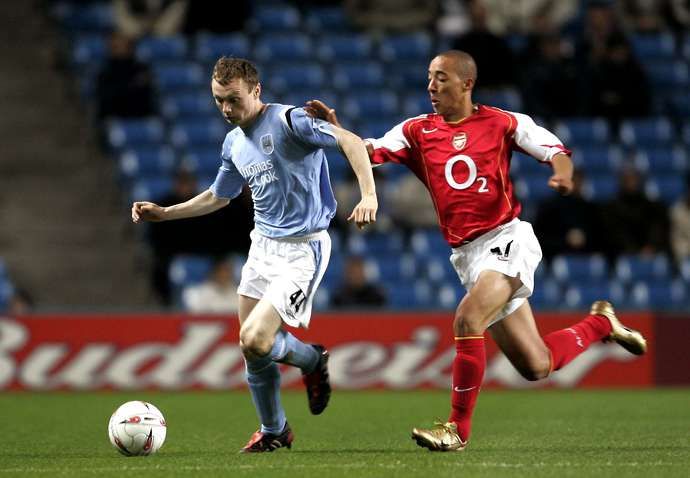 Ryan Smith in action for Arsenal