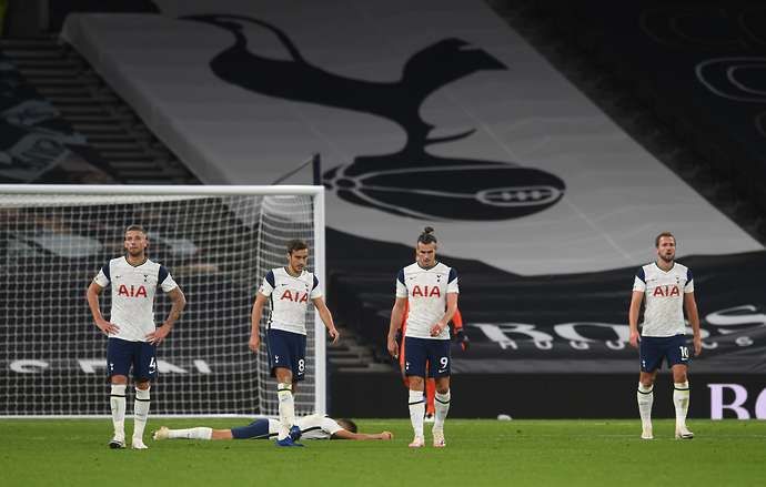 Tottenham players look dejected after collapsing vs West Ham