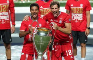 Serge Gnabry and Leon Goretzka with the Champions League trophy