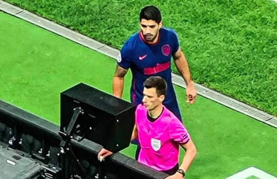 Luis Suarez was caught trying to sneak a peak at the VAR monitor