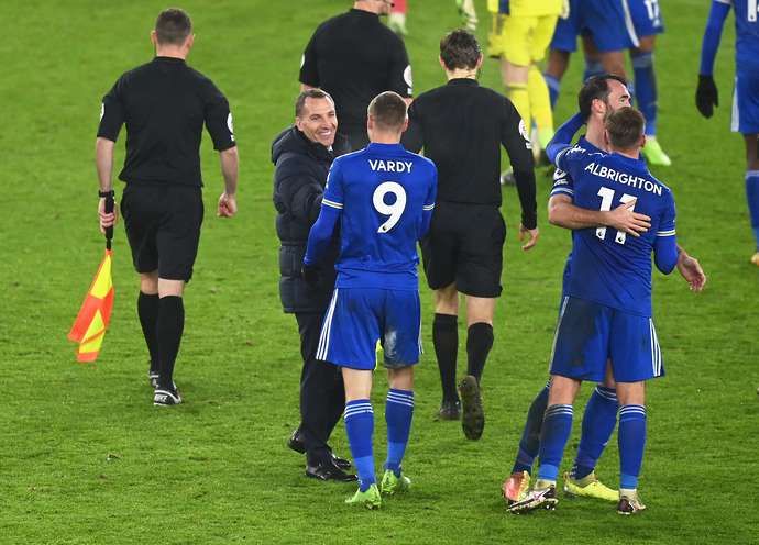 Leicester City manager Brendan Rodgers hugs Jamie Vardy