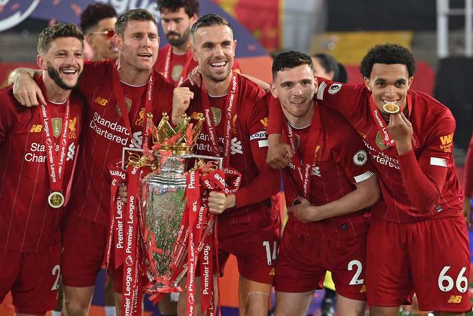 Liverpool players with the Premier League trophy