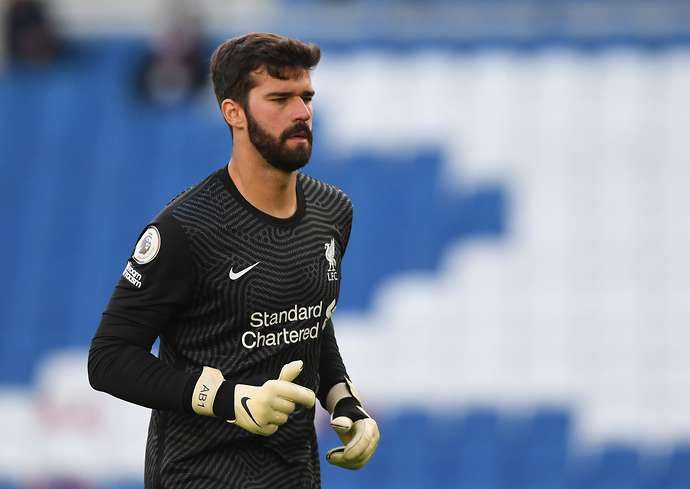 Alisson Becker in action for Liverpool
