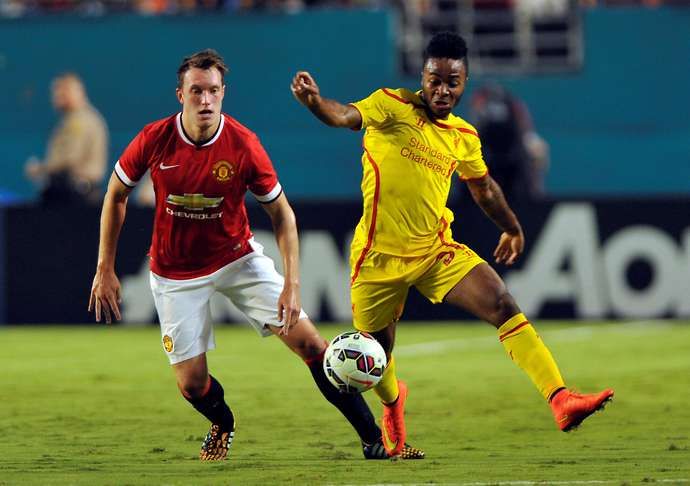 Liverpool's Raheem Sterling and Manchester United's Phil Jones