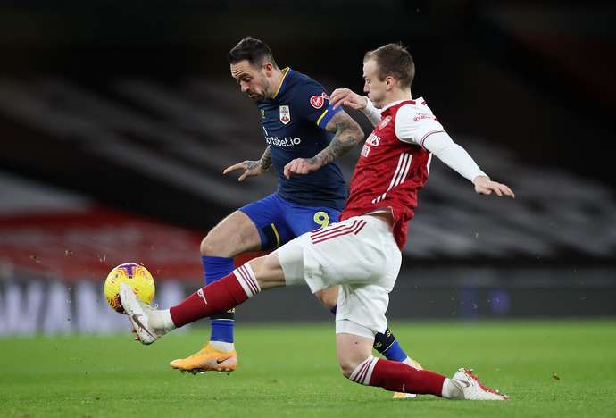 Rob Holding challenges Danny Ings
