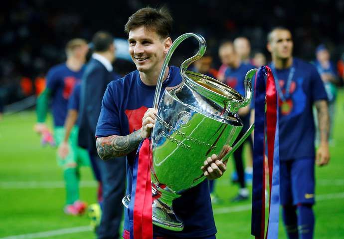 Messi with the CL trophy
