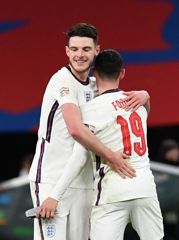 Declan Rice and Phil Foden in action for England