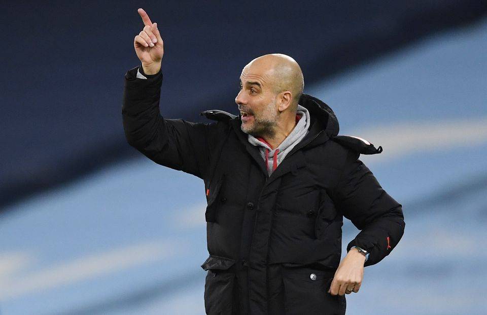 Manchester City manager Pep Guardiola on the touchline