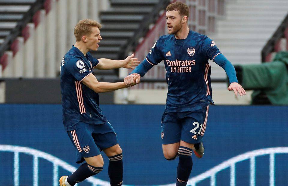Martin Odegaard (left) and Calum Chambers in West Ham 3-3 Arsenal