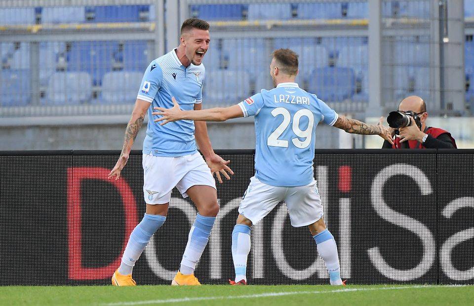 Lazio star Sergej Milinkovic-Savic celebrates with his teammate
