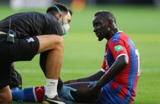 Crystal Palace defender Mamadou Sakho receiving treatment