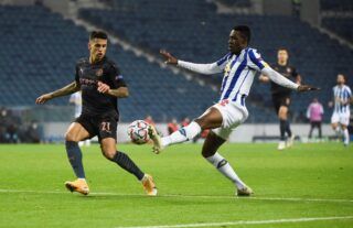 Porto defender and Wolves target Zaidu Sanusi in action against Man City