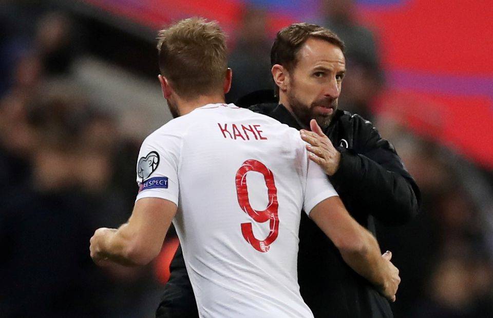England manager Gareth Southgate embraces Tottenham's Harry Kane