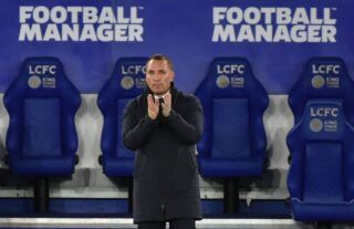 Leicester City manager Brendan Rodgers watches on