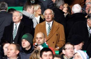 Celtic owner Dermot Desmond watches a Champions League game