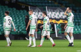 Celtic players look dejected after losing to AC Milan in the Europa League