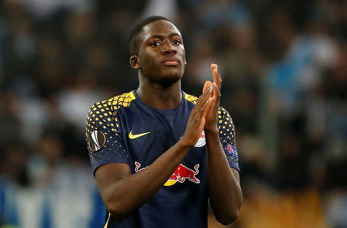 RB Leipzig's Ibrahima Konate looks dejected as he applauds the fans at the end of the match