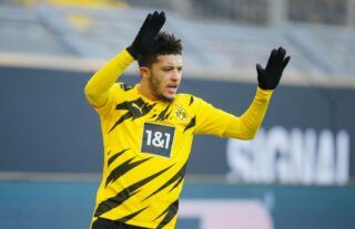 Borussia Dortmund forward and potential Liverpool target Jadon Sancho celebrates