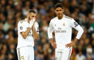 Real Madrid defender Raphael Varane with Karim Benzema