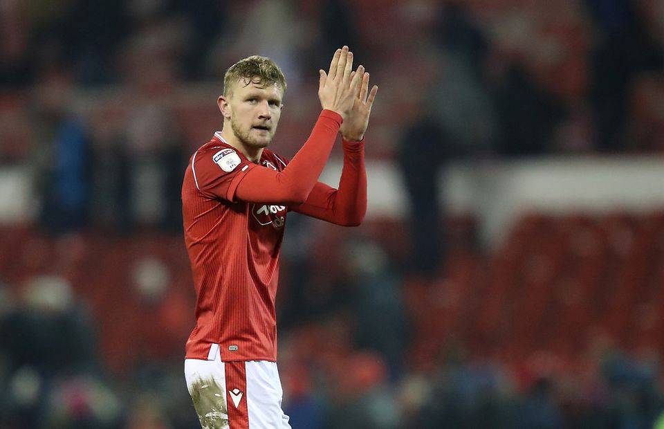 Nottingham Forest defender and West Ham target Joe Worrall claps supporters