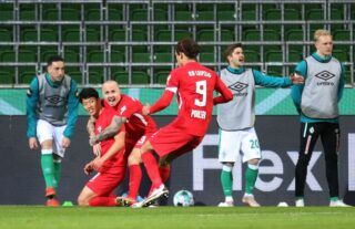 RB Leipzig forward and Crystal Palace target Hwang Hee-chan celebrating a goal