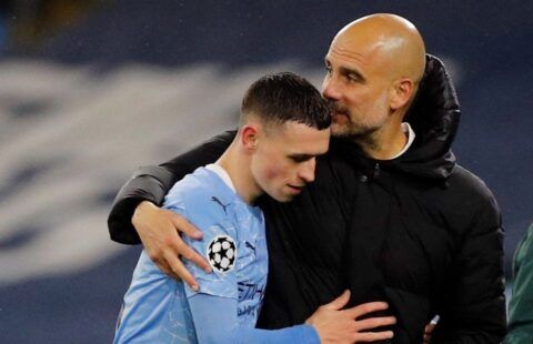 Phil Foden embraced by Pep Guardiola after Manchester City's win against PSG in the Champions League