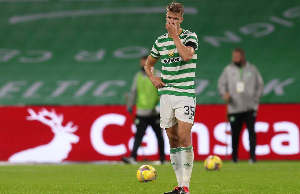 Celtic defender Kristoffer Ajer looks dejected after losing in the Champions League qualifer at Parkhead