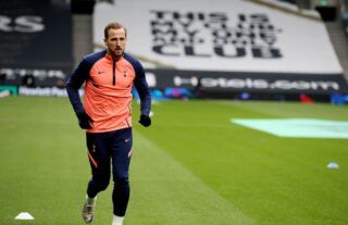 England captain Harry Kane warms up before playing Sheffield United in the Premie League