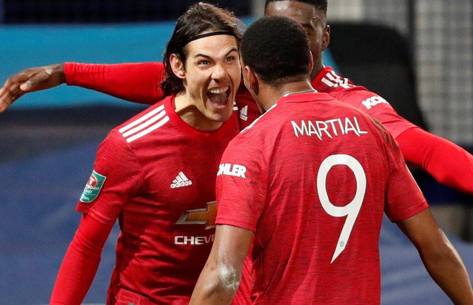 Edinson Cavani and Anthony Martial in action for Man United