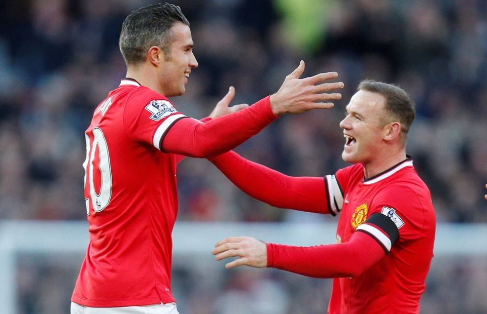 Wayne Rooney and Robin van Persie in action for Man United