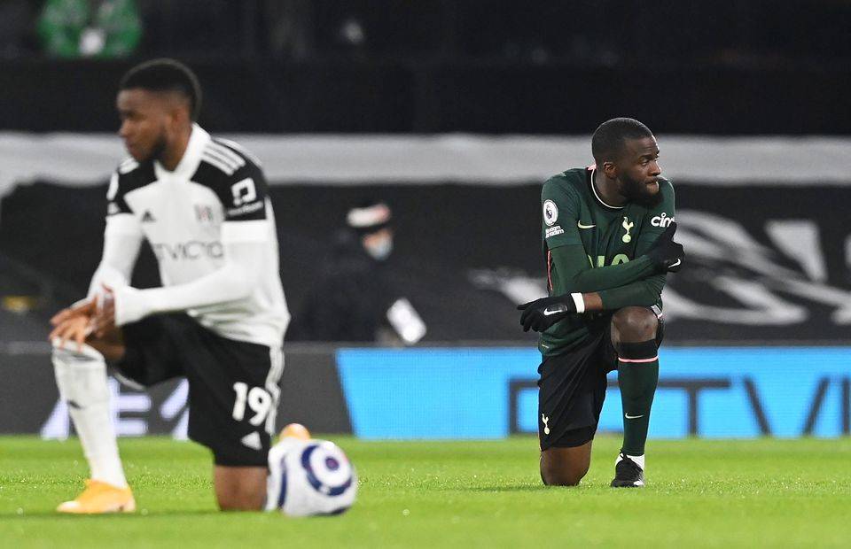 Tottenham midfielder and Real Madrid target Tanguy Ndombele taking a knee