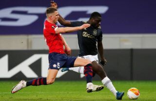 Manchester United target Sven Botman in action for Lille amid speculation over his future