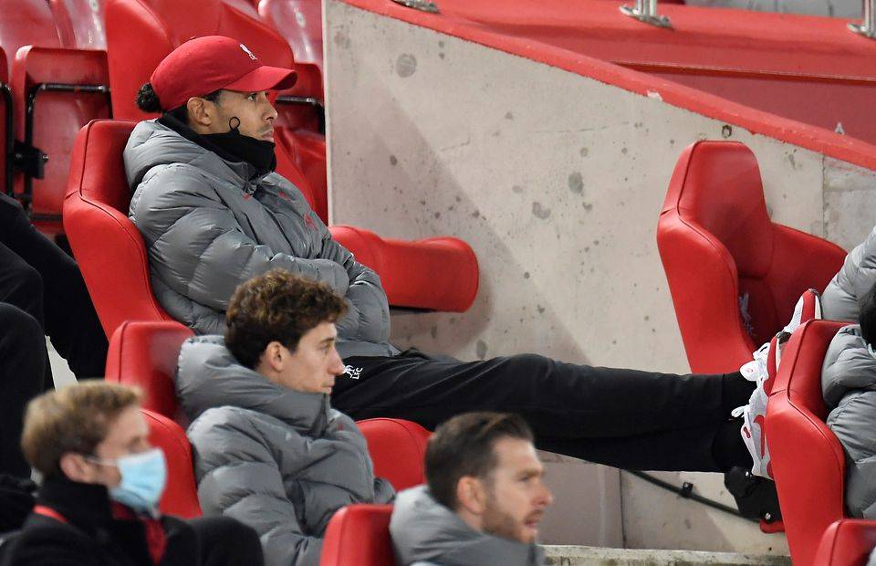 Injured Liverpool star Virgil van Dijk watches his side play Wolves in the Premier League at Anfield