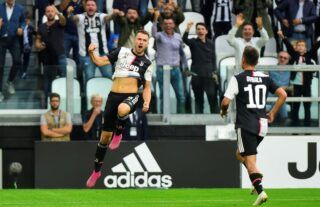 Juventus midfielder and Liverpool target Aaron Ramsey celebrating a goal