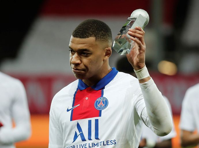 Mbappe with an award