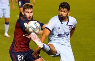Osasuna midfielder and Crystal Palace target Jon Moncayola battling with Diego Costa
