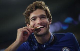 Marcos Alonso celebrates Chelsea's Champions League victory