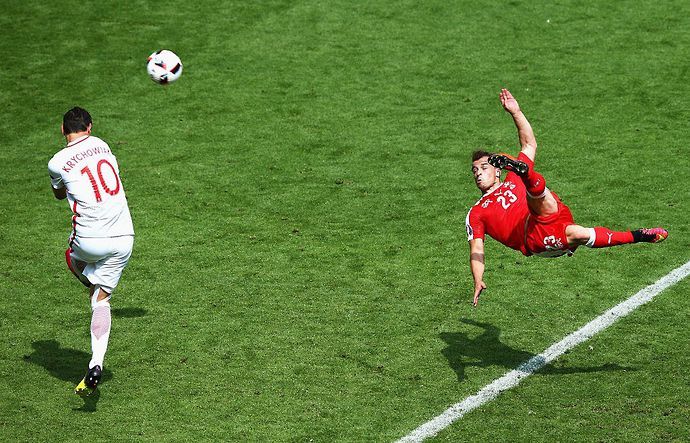 Xherdan Shaqiri scores volley for Switerland vs Poland at Euro 2016