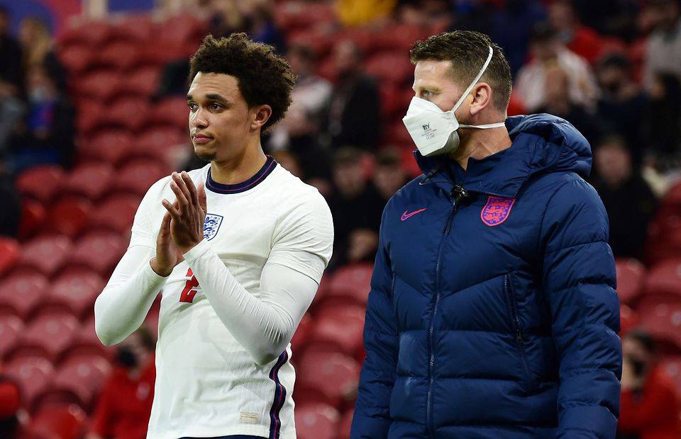 Liverpool and England defender Trent Alexander-Arnold claps fans after going off injured