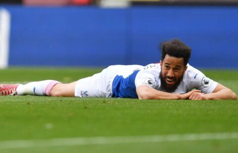 Crystal Palace winger Andros Townsend lying down on the pitch