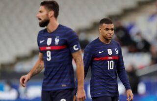 Olivier Giroud and Kylian Mbappe in action for France