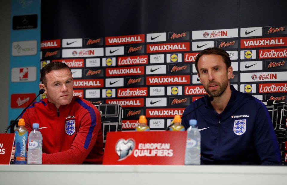 England manager Gareth Southgate in a press conference with Wayne Rooney