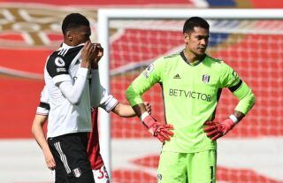 Tosin Adarabioyo in action for Fulham against Arsenal amid speculation over his future