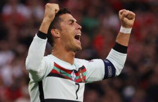 Cristiano Ronaldo celebrates for Portugal amid speculation over a move to Man United