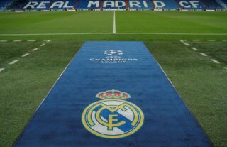 Real Madrid logo on the pitch at the Bernabeu