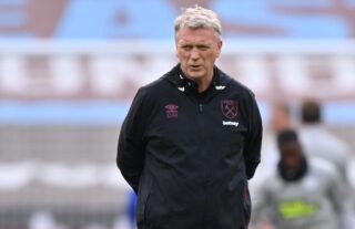 West Ham manager David Moyes with his hands behind his back