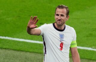 Tottenham striker Harry Kane waving to the Wembley crowd after an England game
